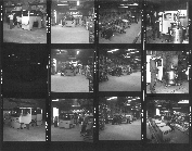 sheet of old photos showing men working in the shop